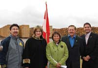 Vice Chief Eric Sylvestre, Meadow Lake Tribal Council; Minister of State Lynne Yelich; Chief Helen Ben, Meadow Lake Tribal Council; Mayor Darwin Obrigewitsch, Town of Meadow Lake; and, MP Rob Clarke at the NorSask sawmill in Meadow Lake.