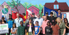 MP Bruinooge gathers with dignitaries as well as volunteers, staff and youth of the Broadway Neighbourhood Centre.